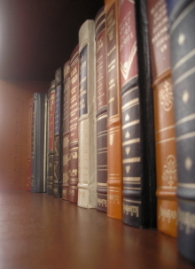 _a shelf of leatherbound books_