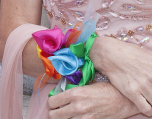satin ribbon corsage on a woman's wrist