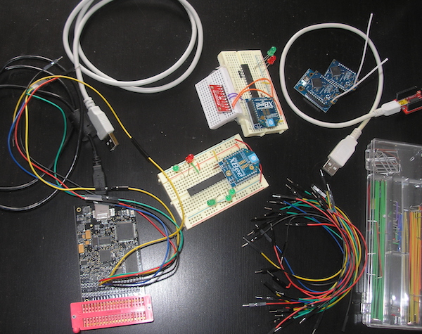 breadboard with wires, xbee radios, LEDs, and other electronics parts